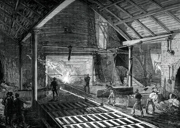 Het gesmolten ijzer in de varkens gieten, ca. 1880