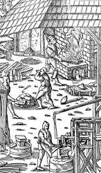 Ijzer smelten en staven hameren met een mechanische hamer