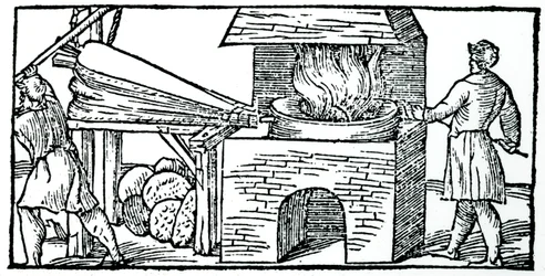 Balg gebruiken om de trek in een oven te vergroten, 1540
