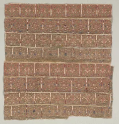 Kledingstukfragment met sterren in verspringende vierkanten