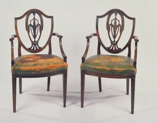 Paar George III rozenhouten eetkamerstoelen, naar een ontwerp van George Hepplewhite