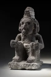 Een Azteekse stenen figuur van een Macuilxochitl, c.1200-1521