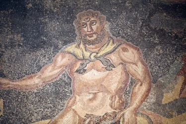 Polyphemus Hall. Detail van de cycloop die de ingewanden van een geit verslindt. Romeinse Villa van de Casale, Sicilië. UNESCO-site.