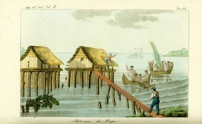 Paaldorpen in de oceaan op Rawak Island, Papoea-Nieuw-Guinea