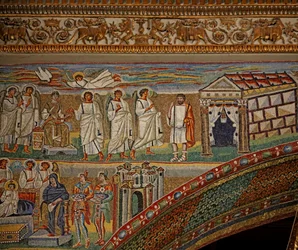 De linker apsisboog (Triomfboog) met de Geboorte - Jozef krijgt een uitleg