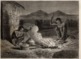 Smeden in Simiango, aan de oevers van de Zambezi-rivier. Gravure ter illustratie van Dr. Livingstone