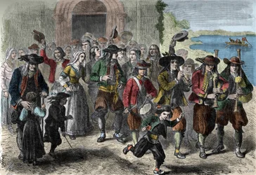 Bretonse gewoonte: stel jonge echtparen bij de uitgang van de kerk. Aan de top van de stoet zijn spelers van biniou en drum. Treguennec, Finistère (29)