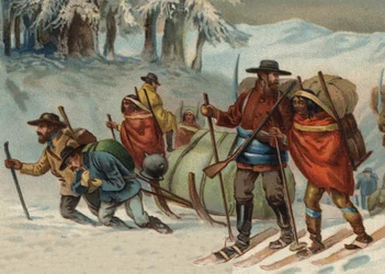 Goudzoekers op weg naar Klondyke, Alaska in de 19e eeuw.