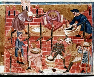Metselaars en huizenbouwers. Miniatuur uit “De daden van de Romeinen”, 13e eeuw. Venetië, Biblioteca Marciana