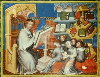 Kloosterschool van het klooster van de heremieten van Sint-Augustinus in Parijs: een monnik op een preekstoel leest een les met tieners met tonsuren maar ook met leken. Rechts een poundwiel. Miniatuur in 