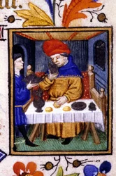 Voorstelling van de maand januari. Een dienaar zet eten op de tafel van zijn meester. Miniatuur van een 14e eeuws manuscript