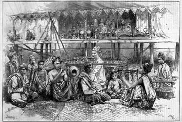 Poppentheater met muzikanten in Birma. Gravure in "The Illustrous World"