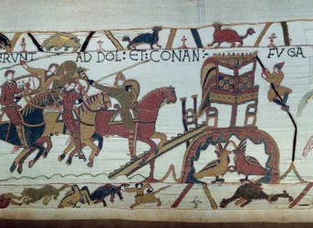 De legers van Willem de Veroveraar (1027-1087) gingen vechten tegen de hertog van Bretagne, aangekomen in Bayeux. Harold is net tot ridder geslagen door Willem. Detail van het Tapijt van Bayeux of Borduurwerk van Koningin Mathilde