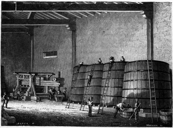 Vaten en pers gebruikt in de wijnkelders van Bourgondië Clos Vougeot. Gravure uit de 19e eeuw