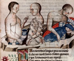 Antaeus de reus laat Dante en Vergilius op de bevroren grond van de cirkel van Verraad (lied 31 uit de Hel, in de Goddelijke Komedie) - miniatuur 15e eeuw