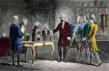 Antoine Laurent Lavoisier (1743-1894) voert de ontleding van lucht uit in 1776 - Antoine Laurent Lavoisier Engelse chemicus, toont mede-wetenschappers zijn experiment dat de samenstelling van lucht onthulde in 1776 - Gravure van Louis Figuier