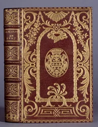 Boekomslag, band met versieringen van de familie Cotte van een almanak uit 1747