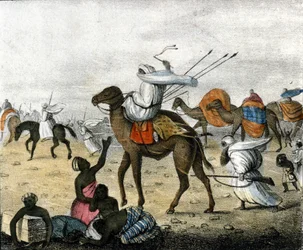 Karavaan in de woestijn in Marokko tijdens een zandstorm