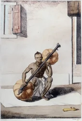 Indiase cultuur, beschaving en samenleving: muzikant met traditioneel Indiaas snaarinstrument. Gravure uit 1808.