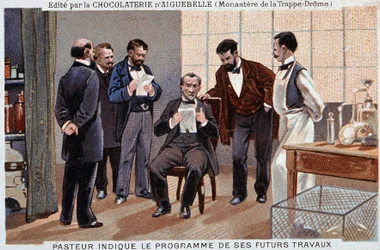 Louis Pasteur, een Franse wetenschapper (1822-1895), gaf het programma van zijn toekomstige werk aan, omringd door medewerkers - chocolade reclame-etiket van Aiguebelle, v. 1895