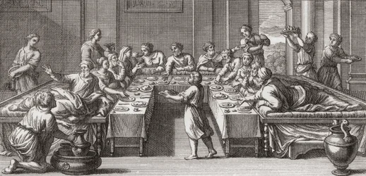Romeins triclinium, of eetkamer, met tafel en rustbedden