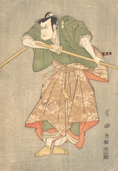 De acteur Kataoka Nizaemon in ceremoniële gewaden van groen en roze