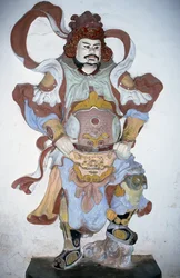 Standbeeld van een tempelbewaker, Thien Mu-pagode, Hue, Vietnam