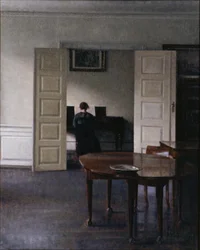 Interieur met Ida die Piano Speelt
