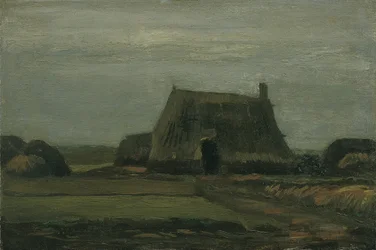 Boerderij met stapels turf