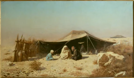 Arabier in de woestijn die de Koran leest