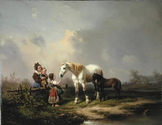 Het voeren van de merrie en het veulen