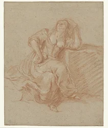 Zittende vrouw in loszinnige pose