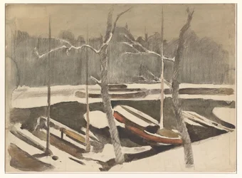 Gemeerde schuiten aan een besneeuwde gracht