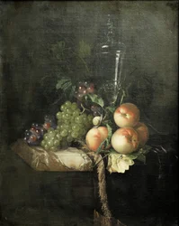 Druiven, perziken en grote glazen