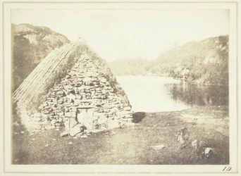 Hooglandhut aan de oevers van Loch Katrine