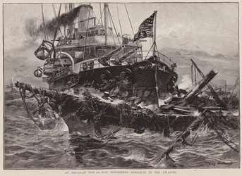 Een Amerikaans oorlogsschip vernietigt wrakken in de Atlantische Oceaan (litho)