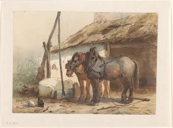Twee paarden staand voor een stal