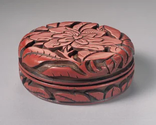 Ronde gesneden cinnaberdoos en deksel